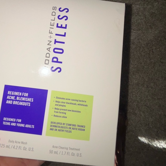 Rodan + Fields Spotless Skincare Box with Blue and Purple Text - Picture 1 of 3